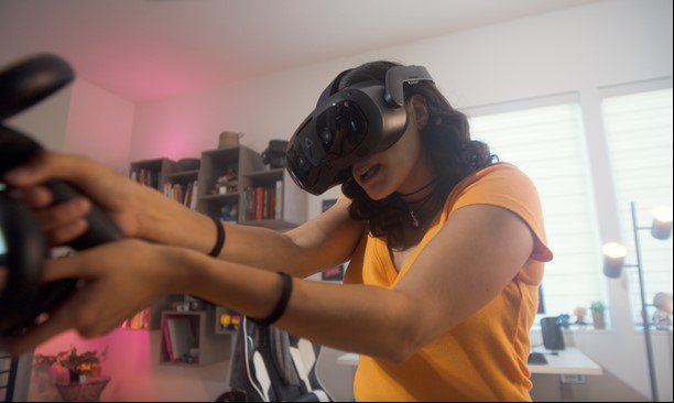 An immersive VR gaming scene with a player wearing a VIVE Focus Vision, showcasing the high resolution and wide field of view.