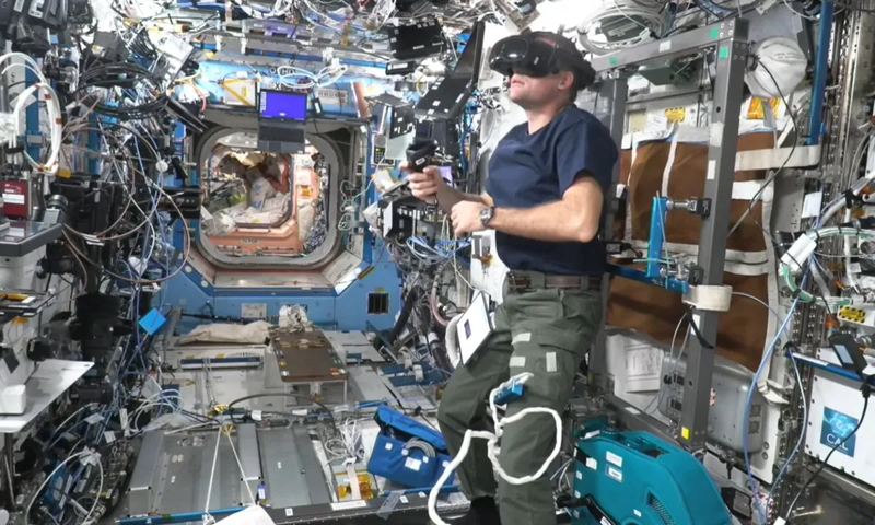 ESA astronaut Andreas Mogensen tests the Focus 3 headset on the International Space Station