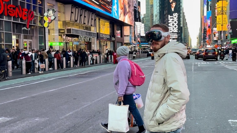 The scenes in - Ready Player One - where characters roam the streets wearing VR, are gradually being realized with the Vision Pro launch