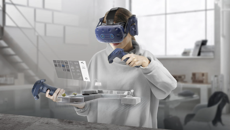 Woman using VIVE Pro Eye headset and controllers